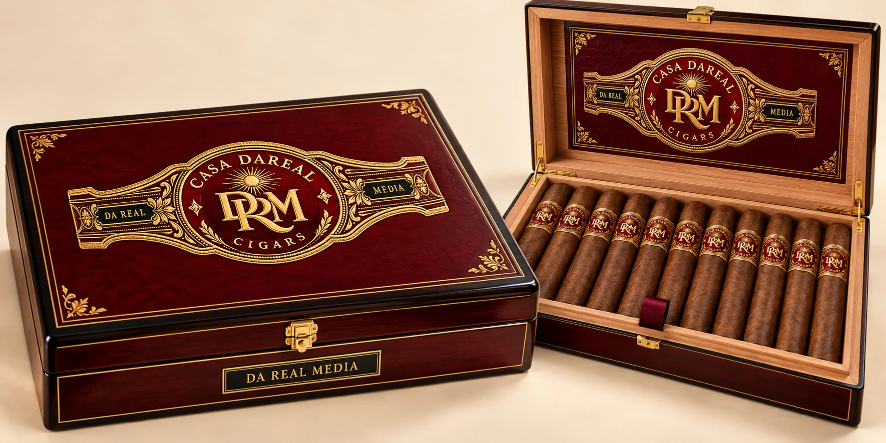 The CASA DAREAL presentation box, closed and open: burgundy lacquer with the gold band artwork on the lid, a brass clasp and a DA REAL MEDIA plaque, and a cedar-lined row of banded cigars inside.